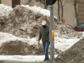 Piles of snow remain large in Winnipeg and they could grow again as a system is going to bring significant precipitation with a forecast mix of rain and snow this weekend.