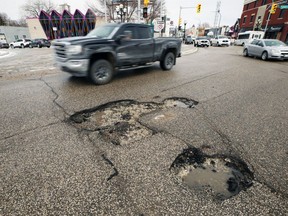 Potholes on Pembina Highway between Osborne Street and Corydon Avenue in Winnipeg on Mon., April 25, 2022.