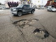 Potholes on Pembina Highway between Osborne Street and Corydon Avenue in Winnipeg on Mon., April 25, 2022.  KEVIN KING/Winnipeg Sun/Postmedia Network