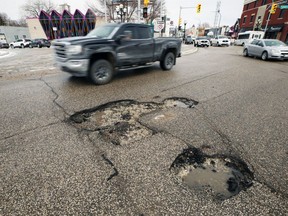 A pothole cluster on Pembina Highway