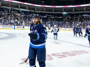 Manitoba Moose left winger Evan Polei celebrates his goal in the first period of Manitoba's 7-3 victory over the Milwaukee Admirals in Game 4 of the AHL playoffs at the Canada Life Centre in Winnipeg on Friday. Game 5 of the best-of-five semifinal is Sunday afternoon.