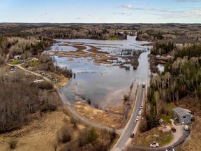 Drone shots show flooding on Essex Road north of Kenora, Ont., forcing hundreds of residents to evacuate the area. Matt Kennedy/Upriver Media