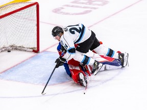 Winnipeg Ice winger Mikey Milne scores one of his three goals of the game, in the third period against the Edmonton Oil Kings last night at Wayne Fleming Arena.