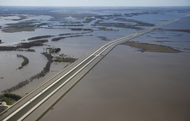 Some sections of Highway 75 south to the United States are closed as a result of Red River flooding south of Winnipeg, Sunday, May 15, 2022. John Woods/Pool/The Canadian Press