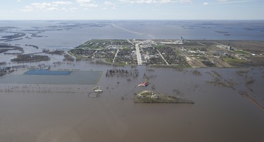 The town of Morris, Man., has closed it’s dikes due to result of Red River flooding south of Winnipeg, Sunday, May 15, 2022. John Woods/Pool/The Canadian Press