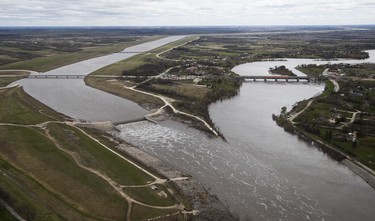 The Winnipeg Floodway outlet, left and the Red River just north of Winnipeg, Sunday, May 15, 2022. The floodway is used to divert Red River flood water around the city of Winnipeg. John Woods/Pool/The Canadian Press