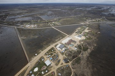 Peguis First Nation with surrounded with Fisher River flood water north of Winnipeg, Sunday, May 15, 2022. Residents of the community were evacuated. The river levels have dropped considerably this week. John Woods/Pool/The Canadian Press