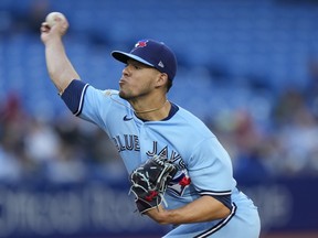 Blue Jays starting pitcher Jose Berrios works during the first inning against the Seattle Mariners in Toronto, Tuesday, May 17, 2022.