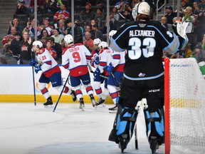 Oil Kings defenceman celebrates one of his first period goals in Edmonton's 7-1 win in Game 5 against the Winnipeg Ice on Friday night in Edmonton.