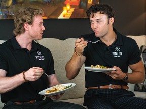 Vitality Meal Prep cofounders Riley Duma (right) and Dan Gauer. A Winnipeg meal prep company that's not even a year old, Vitality Meal Prep is holding the line on its prices and the customer base is actually growing as a result.