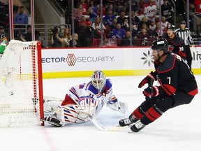 Brendan Smith of the Carolina Hurricanes scores a shorthanded goal against the New York Rangers in Game 2 of the second round of the Stanley Cup Playoffs at PNC Arena on May 20, 2022 in Raleigh, North Carolina.
