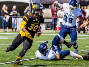 Tyrell Ford, the top pick of the Blue Bombers in the 2022 CFL draft off the Waterloo Warriors, runs for yardage against the U of Toronto Blues.