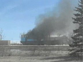 An image shows the MV Poplar River on fire, after it exploded while docked at Hnausa, Man., on May 6, 2022. Damage to the barge has now forced the Poplar River First Nation to declare a state of emergency, because of concerns about how goods and freight will now get into the community. Handout for Winnipeg Sun/Local Journalism Initiative