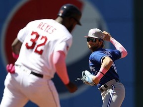 May 8, 2022; Cleveland, Ohio, USA; Toronto Blue Jays Bo Bichette forces out Cleveland Guardians Franmil Reyes to start a double play during the third inning at Progressive Field.