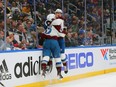 Artturi Lehkonen (62) and Bowen Byram (4) of the Colorado Avalanche celebrate Lehkonen's goal against the St. Louis Blues in the second period during Game Three of the Second Round of the 2022 Stanley Cup Playoffs at Enterprise Center on May 21, 2022 in St Louis.