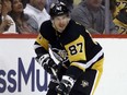 Pittsburgh Penguins center Sidney Crosby skates with the puck against the New York Rangers during the third period in game four of the first round of the 2022 Stanley Cup Playoffs at PPG Paints Arena.