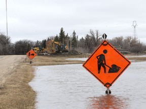 Heavy machinery at the ready on Turnbull Drive in St. Norbert, the southernmost suburb of Winnipeg, on Mon., May 2, 2022.  KEVIN KING/Winnipeg Sun/Postmedia Network