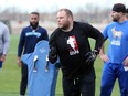Defensive tackle Jake Thomas sports a Canadian Football League Players Association T-shirt as Winnipeg Blue Bombers players worked out at Winnipeg Soccer Federation South Complex on Sunday, May 15, 2022.