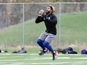 Slotback Nic Demski enjoys himself during a workout by members of the Winnipeg Blue Bombers at Winnipeg Soccer Federation South Complex on Sunday, May 15, 2022.