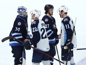 Handshake time for the Manitoba Moose after losing an AHL playoff series to the Milwaukee Admirals in Winnipeg on Sunday, May 15, 2022.
