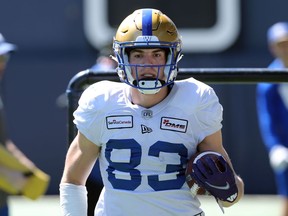 Receiver Dalton Schoen runs with the ball during Winnipeg Blue Bombers training camp on Tuesday, May 24, 2022.