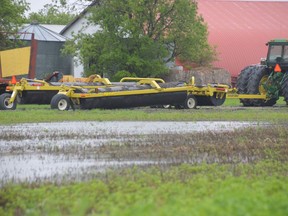 A saturated farmer's field is seen near Île Des Chênes, south of Winnipeg, Monday. With more wet weather predicted for southern Manitoba on Monday and Tuesday, some are concerned about when farmers will be able to get their crops in the ground this growing season.