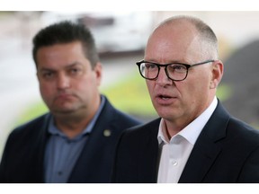 Coun. Scott Gillingham (right) speaks at a press conference where it was announced his mayoral campaign is being endorsed by Coun. Jeff Browaty in Winnipeg on Monday, May 30, 2022.
