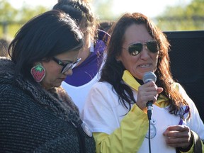 Angie Perry, right, the mother or homicide victim Tessa Perry, struggled to contain her emotions while she spoke to a crowd on Tuesday that had gathered for a vigil to remember and honour her daughter. Dave Baxter/Winnipeg Sun/Local Journalism Initiative