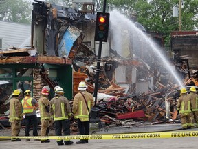 Kenora Fire and Emergency Services Crews work to extinguish flames from a fire that ravaged downtown Kenora overnight on Tuesday, June 28.