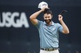 Canadian Adam Hadwin reacts on the ninth green during round one of the 122nd U.S. Open Championship.