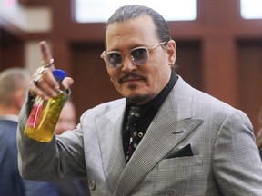 Johnny Depp appears in the courtroom during a break at the Fairfax County Circuit Courthouse in Fairfax, Va., Thursday, May 19, 2022.