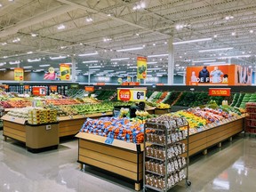 In-store signs indicate opportunities to save on select everyday items.