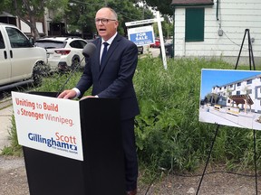 Mayoral candidate Scott Gillingham makes an announcement on homelessness at a city-owned lot on Alexander Avenue in Winnipeg on Wednesday, June 29. Gillingham displayed an example of modular housing from Vancouver.