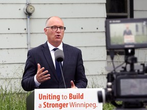 Mayoral candidate Scott Gillingham makes an announcement on homelessness at a city-owned lot on Alexander Avenue in Winnipeg on Wed., June 29, 2022.