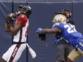The Ottawa Redblacks' Shaq Johnson (88) catches a pass for a touchdown against the Blue Bombers' Tyqwan Glass (22) during the first half on Friday, June 10, 2022. Winnipeg had home-field advantage in the season opener for both teams and pulled out a 19-17 win, but the rematch will be in Ottawa on Friday night.