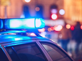 Police cruiser lights at a crime scene