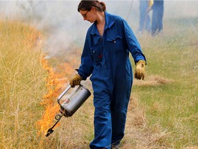 A City of Winnipeg worker conducts a controlled burn in this file photo provided by the City of Winnipeg. The City of Winnipeg will be conducting controlled burns in various natural areas between June 6 and June 17, 2022, weather conditions permitting. Controlled burns will be conducted in suitable wind conditions with appropriate fire guards in place.