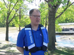 Lifesaving Society Manitoba Water Smart and Safety Management Coordinator Dr. Christopher Love addresses members of the media at The Forks in Winnipeg on Monday, June 6, 2022, after the Winnipeg Fire Paramedic Service Water Rescue team pulled a male youth out of the Red River on Sunday evening, who was spotted clinging to a log as the river current carried him downstream. A local resident Allison Snell spotted the boy and called 911.
