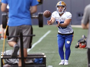 Kicker Marc Liegghio catches snaps from a passing machine during Winnipeg Blue Bombers practice on Tuesday, June 7, 2022.