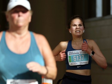 A half-marathon participant enters IG Field during the Manitoba Marathon in Winnipeg on Sunday, June 19, 2022.