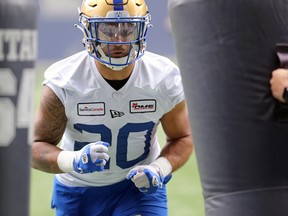 Running back Brady Oliveira works through a drill at Winnipeg Blue Bombers practice on Tuesday, June 21, 2022.