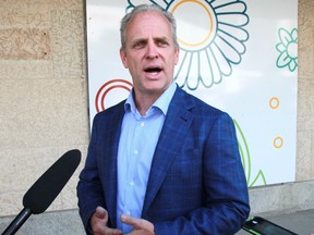 Winnipeg mayoral candidate Rick Shone speaks to the media outside the Hudson's Bay Company building on Portage Avenue on Friday, July 15, 2022.
