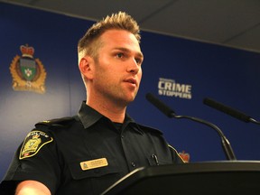 Winnipeg Police spokesperson Const. Jay Murray speaks during a press conference warning the public about a rise in "grandparent scams" at police headquarters in Winnipeg on Thursday, July 28, 2022.