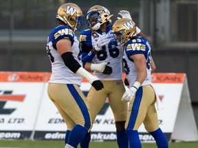 Winnipeg Blue Bombers' Dalton Schoen (83) scores a touchdown on the Edmonton Elks during first half CFL football action at Commonwealth Stadium in Edmonton, on Friday, July 22, 2022.