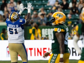 Winnipeg Blue Bombers' Jermarcus Hardrick (51) celebrates a touchdown with teammates on the Edmonton Elks during second half CFL football action at Commonwealth Stadium in Edmonton, on Friday, July 22, 2022.