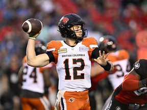 BC Lions quarterback Nathan Rourke (12) throws the ball during first half CFL football action against the Ottawa Redblacks in Ottawa on Thursday, June 30.