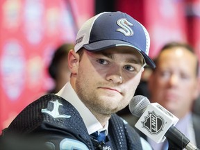 Shane Wright of Canada speaks during a news conference after being selected as the fourth overall pick by the Seattle Kraken during the first round of the 2022 NHL draft in Montreal, Thursday, July 7, 2022.