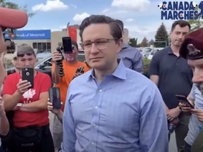 Conservative MP Pierre Poilievre joined James Topp on his march to the National War Memorial on June 30, 2022.