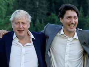 Outgoing U.K. prime minister Boris Johnson with Canada's prime minister Justin Trudeau