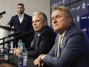 Kevin Cheveldayoff Executive Vice President & General Manager and Winnipeg Jets Head Coach Rick Bowness address the media at Canada Life Centre on July 4, 2022.